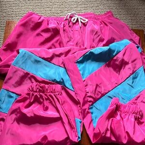 THE 90’s Are Alive! Pink and blue track pants with pockets. Size XL.